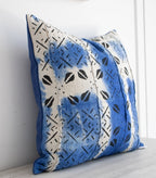 white and blue mud cloth cushion