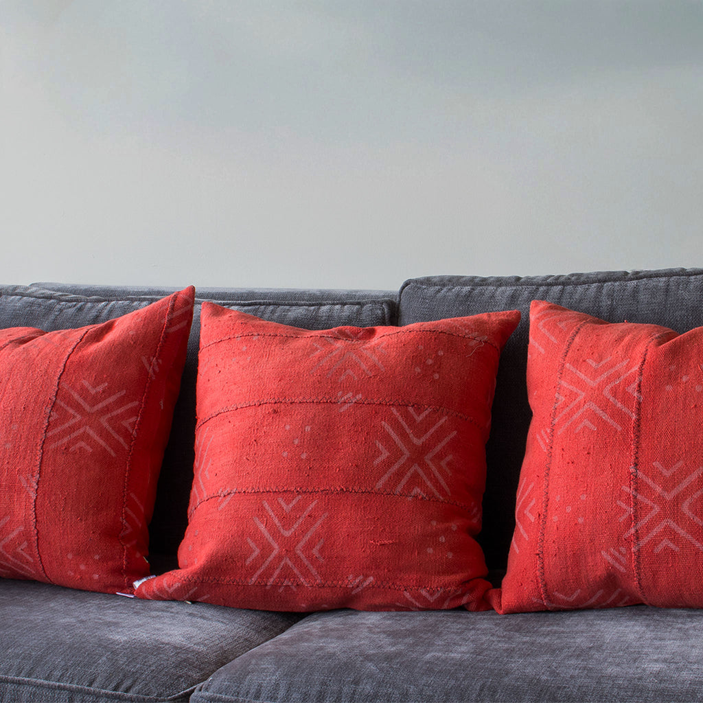 orange mudcloth cushion